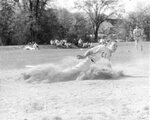 Baseball player slides into a base, circa 1960s by Clark University and Michael J. Novia