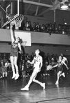 Action shot of men's basketball game [19], 1961 by Clark University