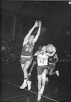 Action shot of men's basketball game [31], circa 1950s-1960s by Clark University