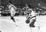 Action shot of men's basketball game [24], 1984 by Clark University