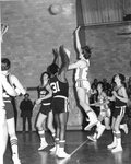 Action shot of men's basketball game [37], circa 1970s by Clark University