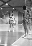 Women’s basketball team member takes a free throw shot [2], circa 1980s by Clark University