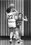 Women’s basketball team member plays defense [2], circa 1980s by Clark University and Betty Jenewin