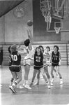 Action shot of women’s basketball team [18], circa 1980s by Clark University