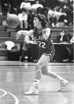 Women’s basketball team member Jodie Ladderbush passes ball, circa 1987 by Clark University and Betty Jenewin