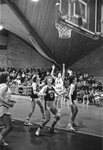 Women’s basketball team in the middle of a game [2], 1986-1987 by Clark University