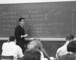 A professor teaching mathematical formulas, early 1970s by Clark University and Michael J. Novia