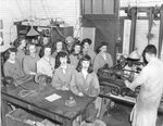 Group photo of female students in workroom, circa 1940s by Clark University