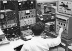 Student uses a laboratory machine [4], 1967 by Clark University and Michael J. Novia