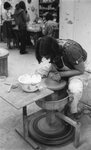 A student making pottery, 1976 by Clark University
