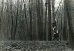Men’s cross country team member runs in meet [3], circa 1970s-1980s by Clark University