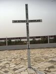 Memorial cross at Gatumba Massacre site, 2022 by Christopher P. Davey