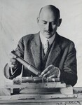 [002] R.H Goddard with steel combustion chamber and nozzle for rocket, 1915 by Unknown