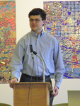 A student introduces a speaker by Robert D. Tobin