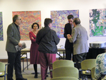 Scholar participants discuss during one of the breaks by Robert D. Tobin